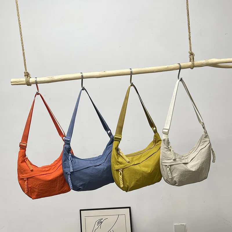 

2025 Solid Color Trendy Personalized Daily Simple Dumpling Bun Versatile Nylon Crossbody Bag for Women's Leisure