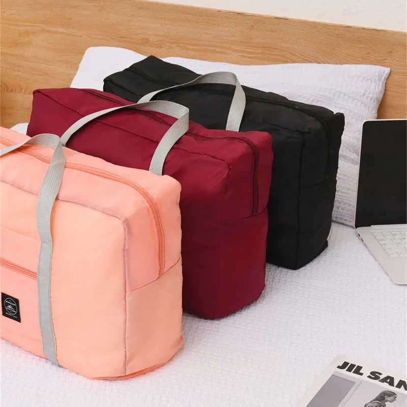 Solid color foldable travel bag Men's and women's clothing bag Shopping shoulder bag with large pull-over luggage bag