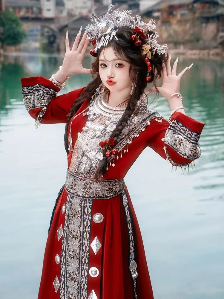 

Travel photography in a red exotic performance costume set