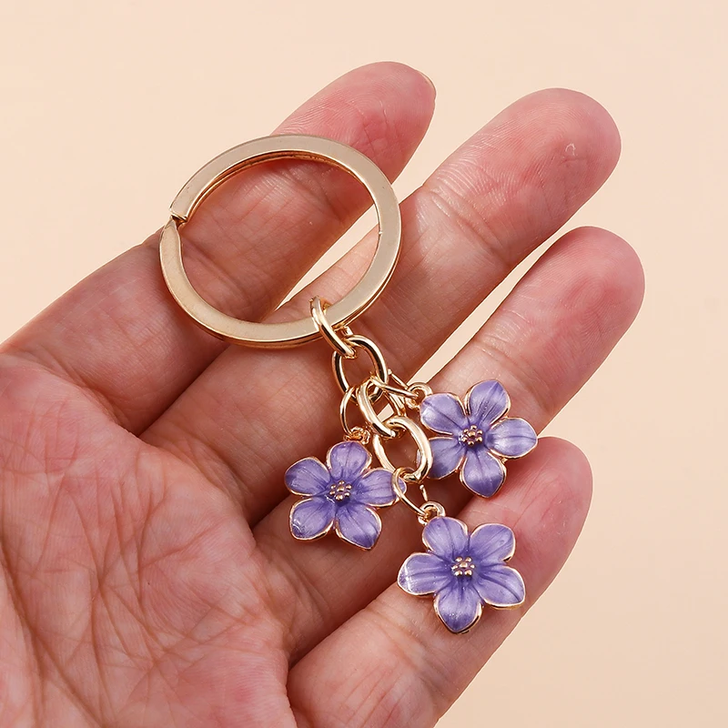 Aihua 40 Farben Niedlicher Pflanzen-Schlüsselanhänger Emaille Sakura-Blumen-Schlüsselanhänger für Frauen Mädchen Handtasche Anhänger Autoschlüsselhalter DIY Schmuck Geschenke – Detail 8
