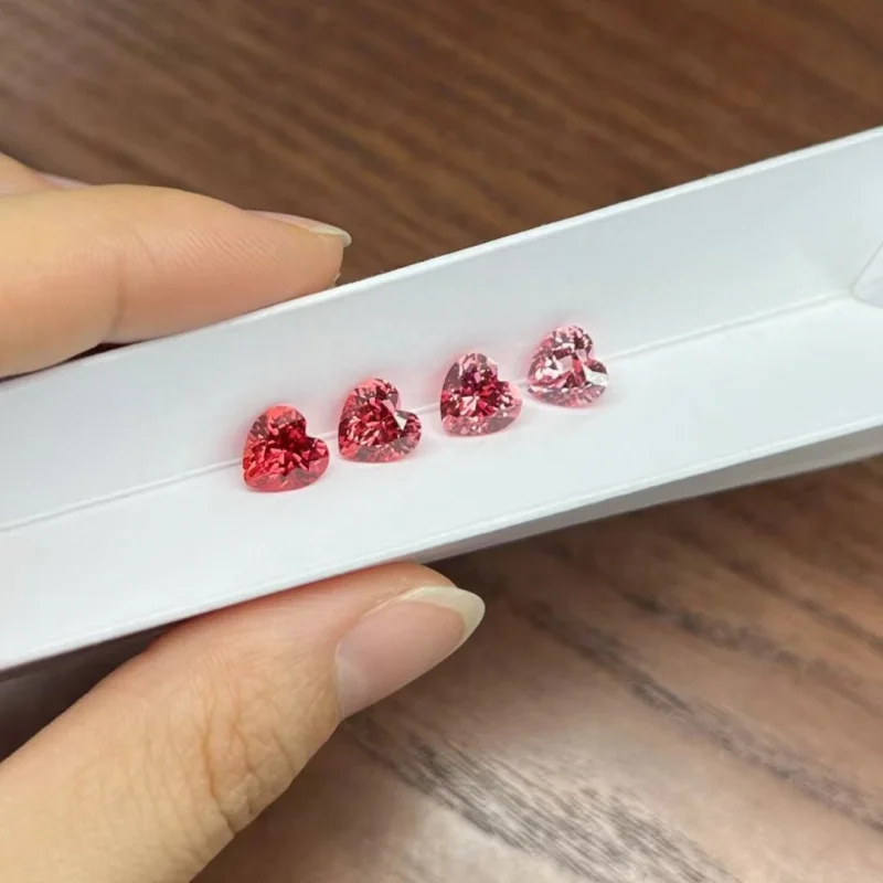 

Bulk Order of Cultivated Padparadscha Gemstones1Carat Heart-Shaped Loose Gemstone Orange Pink Sunset Color In Stock