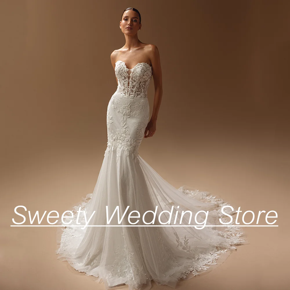

Gorgeous Mermaid Wedding Dress Sweetheart Sleeveless Illusion Applique Glitter Tulle Court Train Weddings Bridal Gown