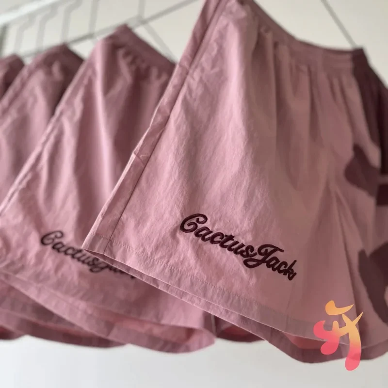 25ss Summer Pink Nylon Quick Drying Cactus Jack Shorts Embroidered Logo Elastic Waist Casual Sports Shorts Men Women