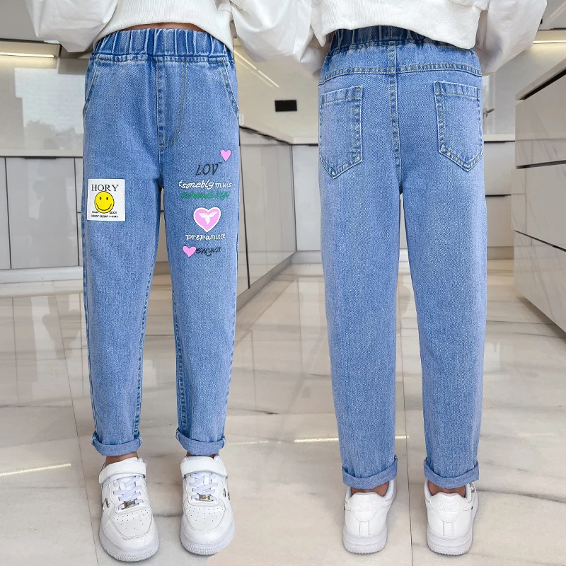 2023 New girls' autumn love smiling face letters jeans Korean version of slim straight pants comfortable girls shopping jeans.