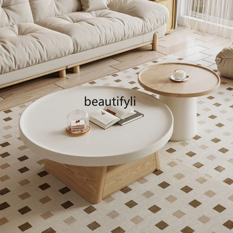 

Living room home modern small apartment log simple round cream style coffee table TV cabinet combination
