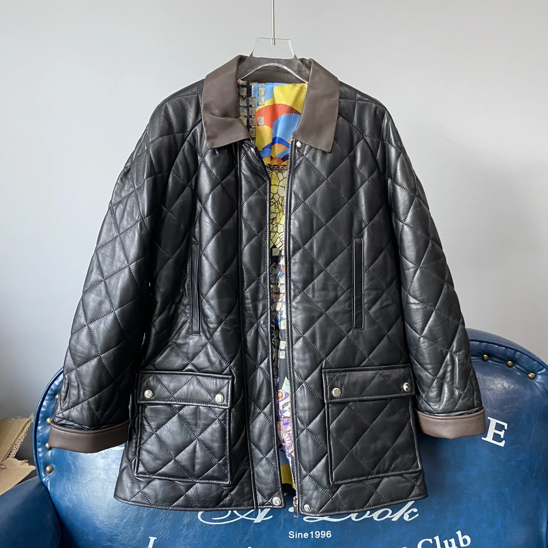 Manteau long en cuir ample pour femme, nouveau modèle d'hiver 2024, motif diamant, en cuir de vachette, style britannique, pour les trajets quotidiens, coupe-vent