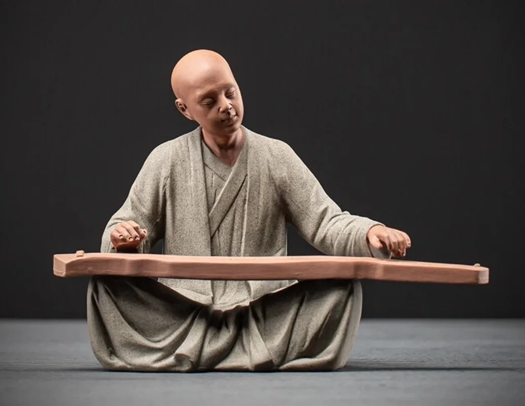 

Chinese Porcelain Monk Playing Zither Statue Buddha Buddhism Zen Figure Decor