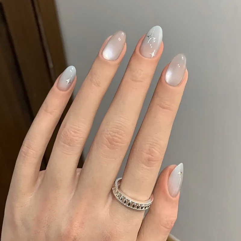 

24pcs Simple White Sheer Gradient Press-On Nails with Cat Eye Star Shine, Medium Almond Shape, Assorted Sizes