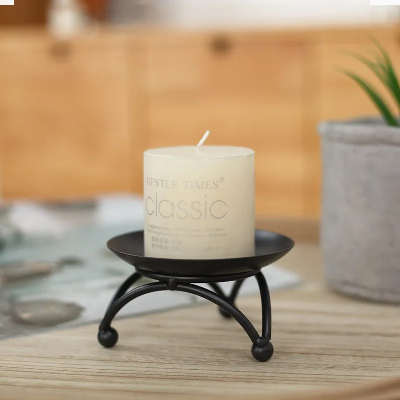 

Simple And Creative Metal Desktop Black Small Candlestick Aromatherapy Candle Tray Metal candlesticks. candlesticks.