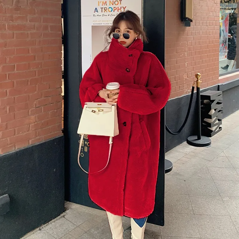 The new casual plush coat for women a mixed fur with long stand-up collar exudes stylish and elegant vibe