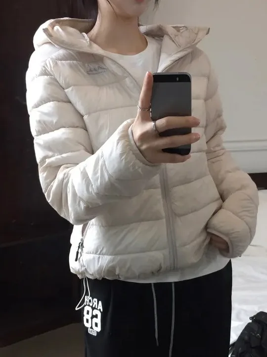 سترة شتوية نسائية على الطراز الكوري، خفيفة الوزن بأكمام طويلة وغطاء للرأس، معطف خارجي نحيف بتصميم عصري وأنيق