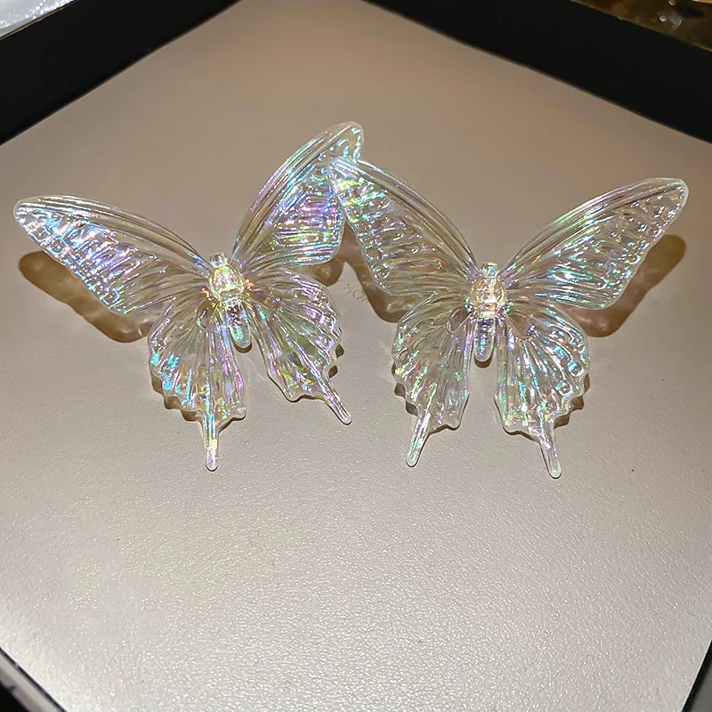 NISHIZAWA-Boucles d'oreilles papillon transparentes en acrylique pour femme, laser nette, tempérament