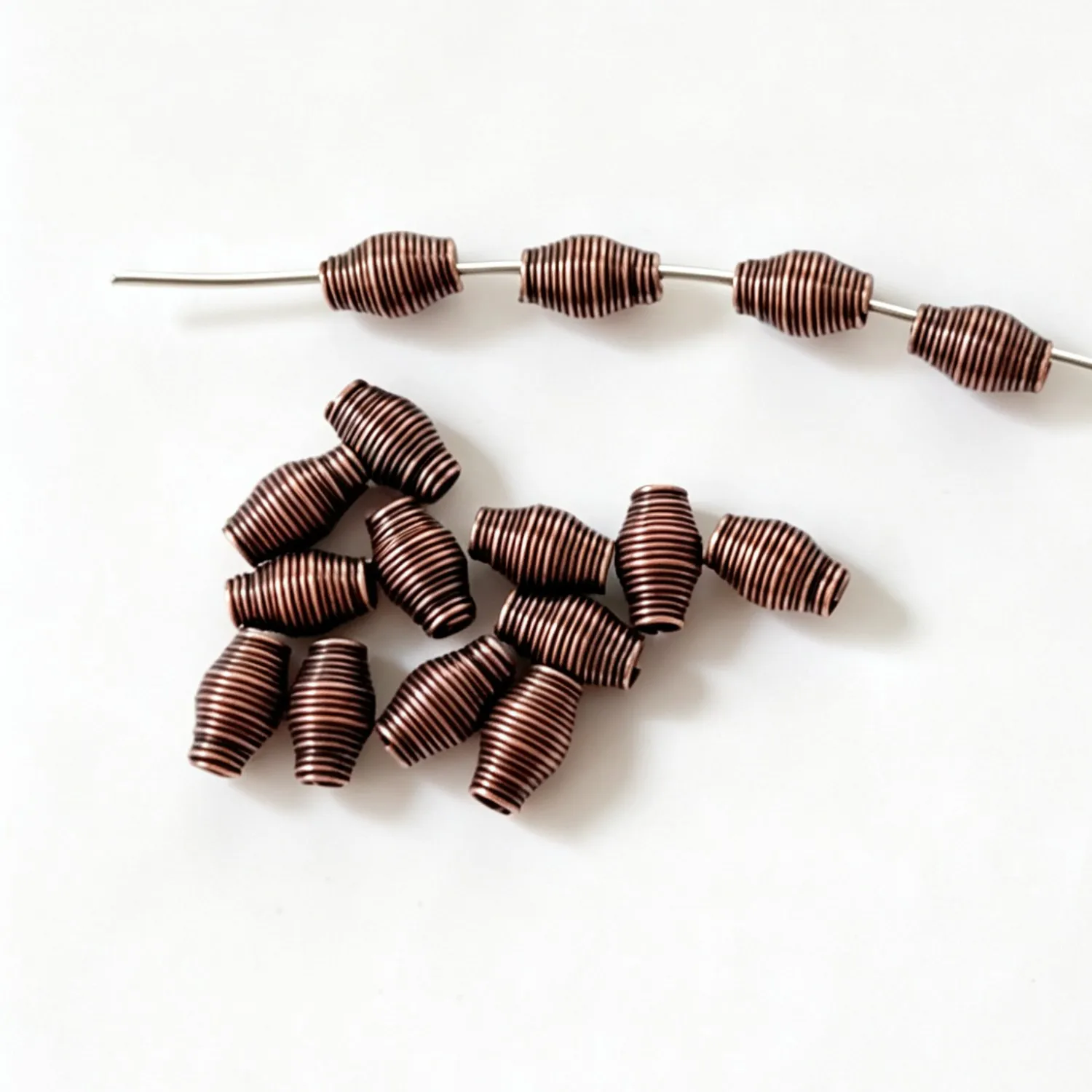 100pcs 8x4mm, hole:1.2mm Antiqued Bronze Wire Swirled Design Spacer Beads H0422