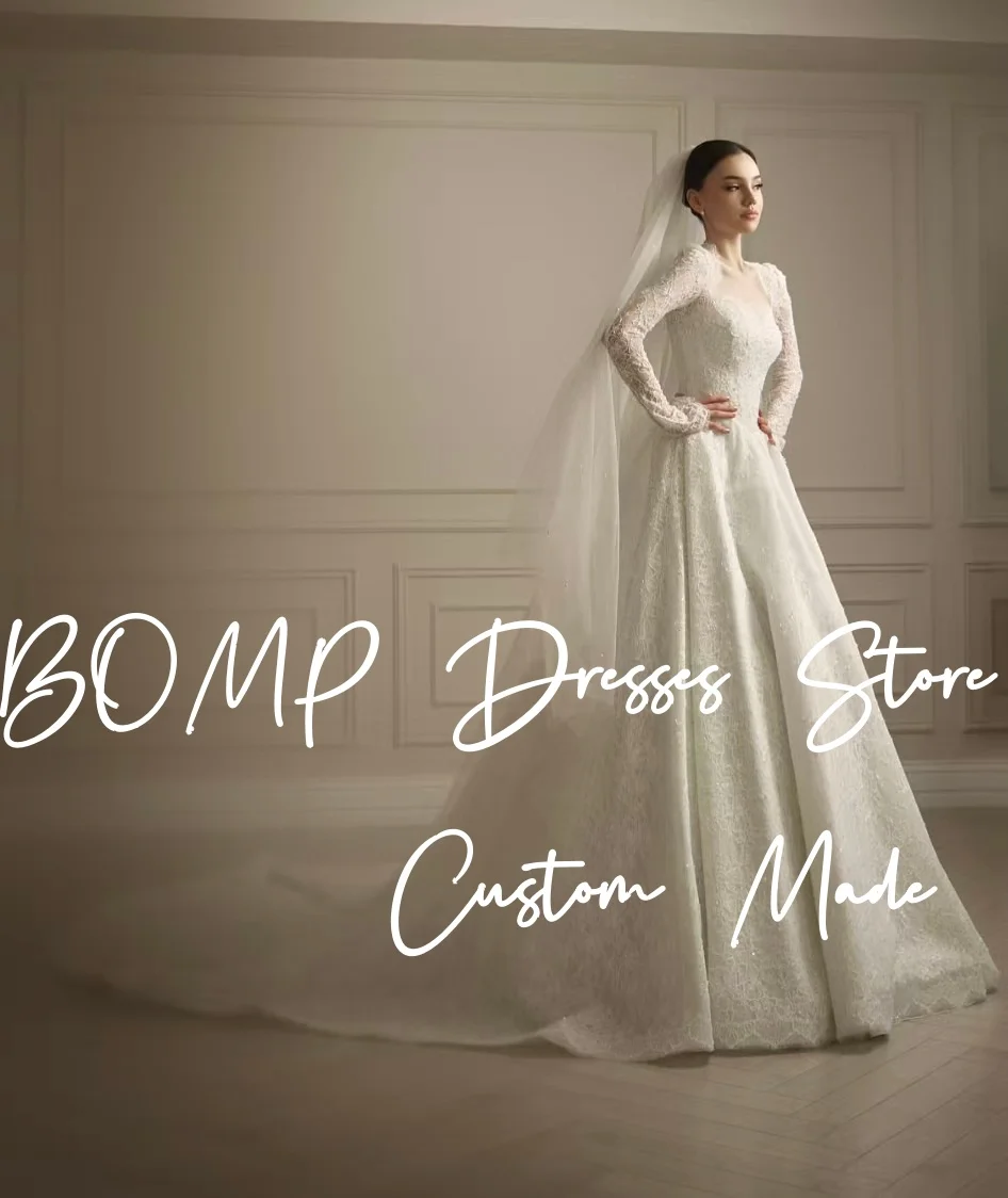 BOMP فستان زفاف فاخر من الدانتيل العاجي على شكل قلب وأكمام طويلة وأزرار ثنيات سويب تراين فستان زفاف مخصص رائع