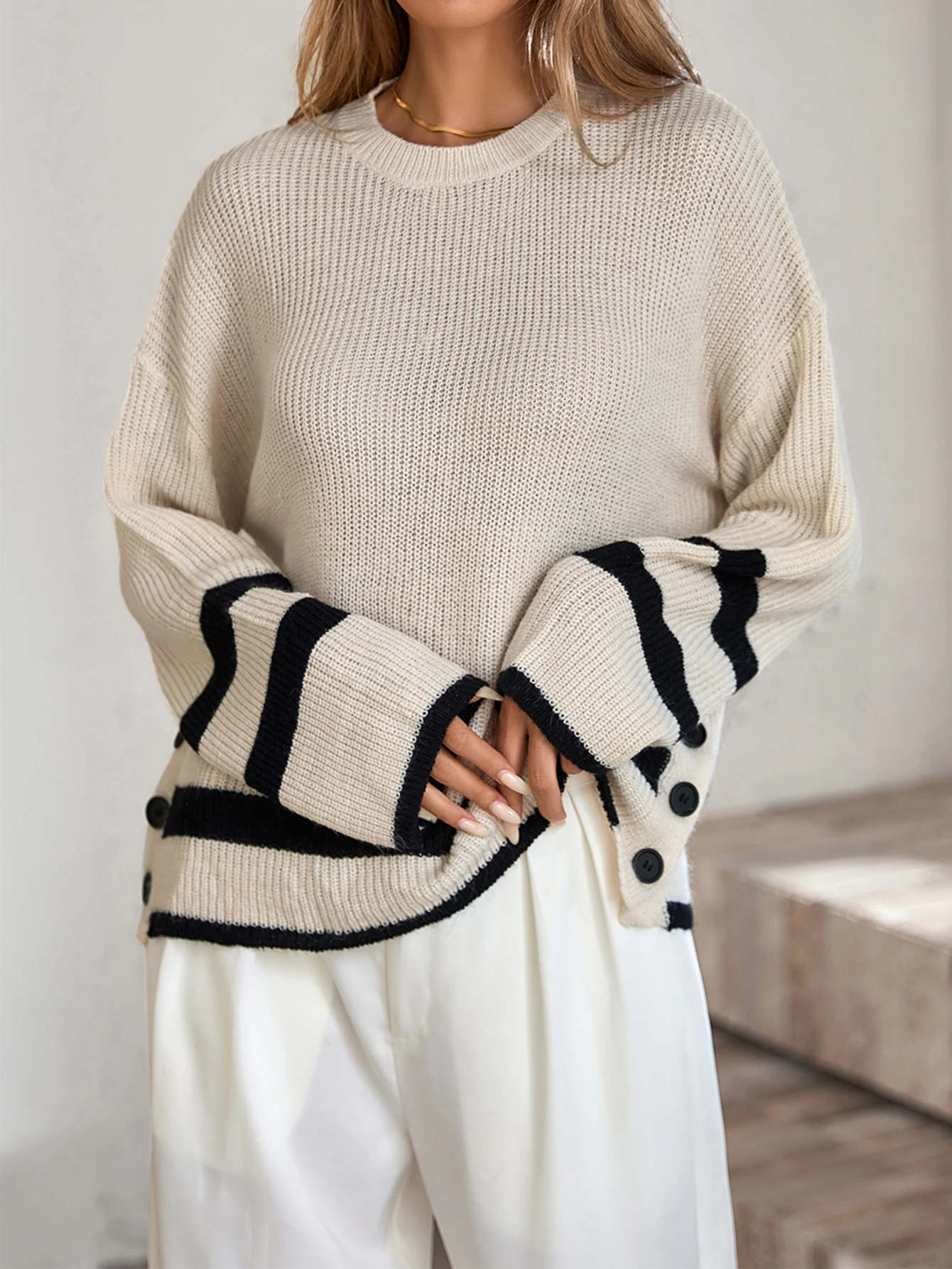 

Europe and the United States autumn and winter French lazy casual style stripes against color edge buckle slit sweater