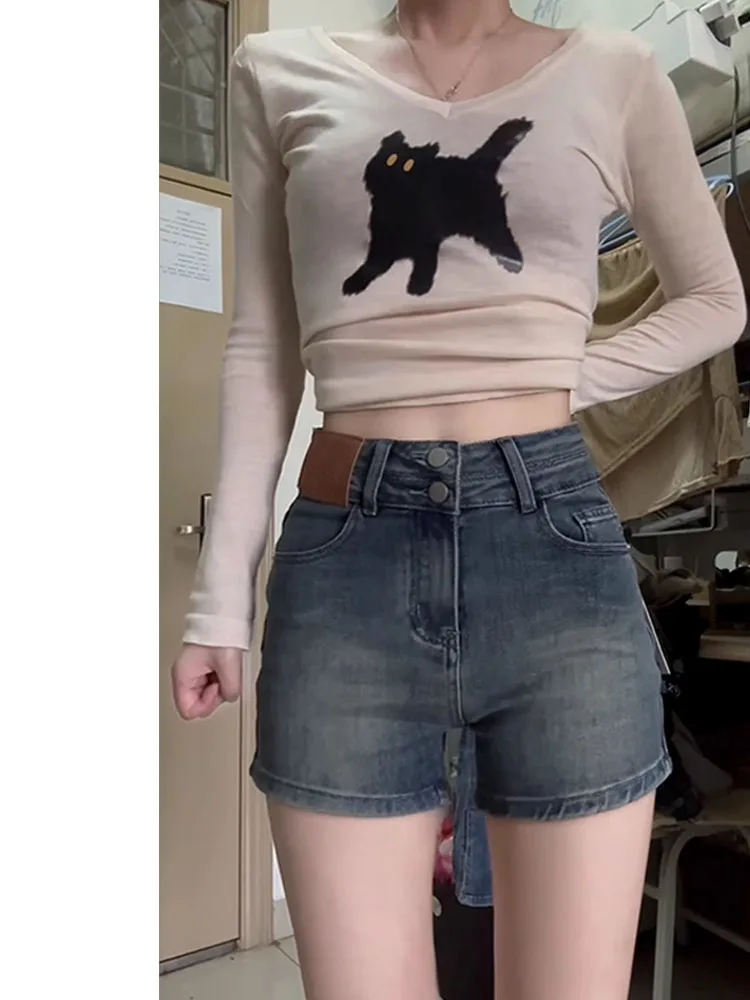 Hochgeschnittene, schlankmachende A-Linien-Jeans-Shorts für Damen, Wintermode, amerikanischer Stil, Hot Pants, figurbetont, hohe Taille