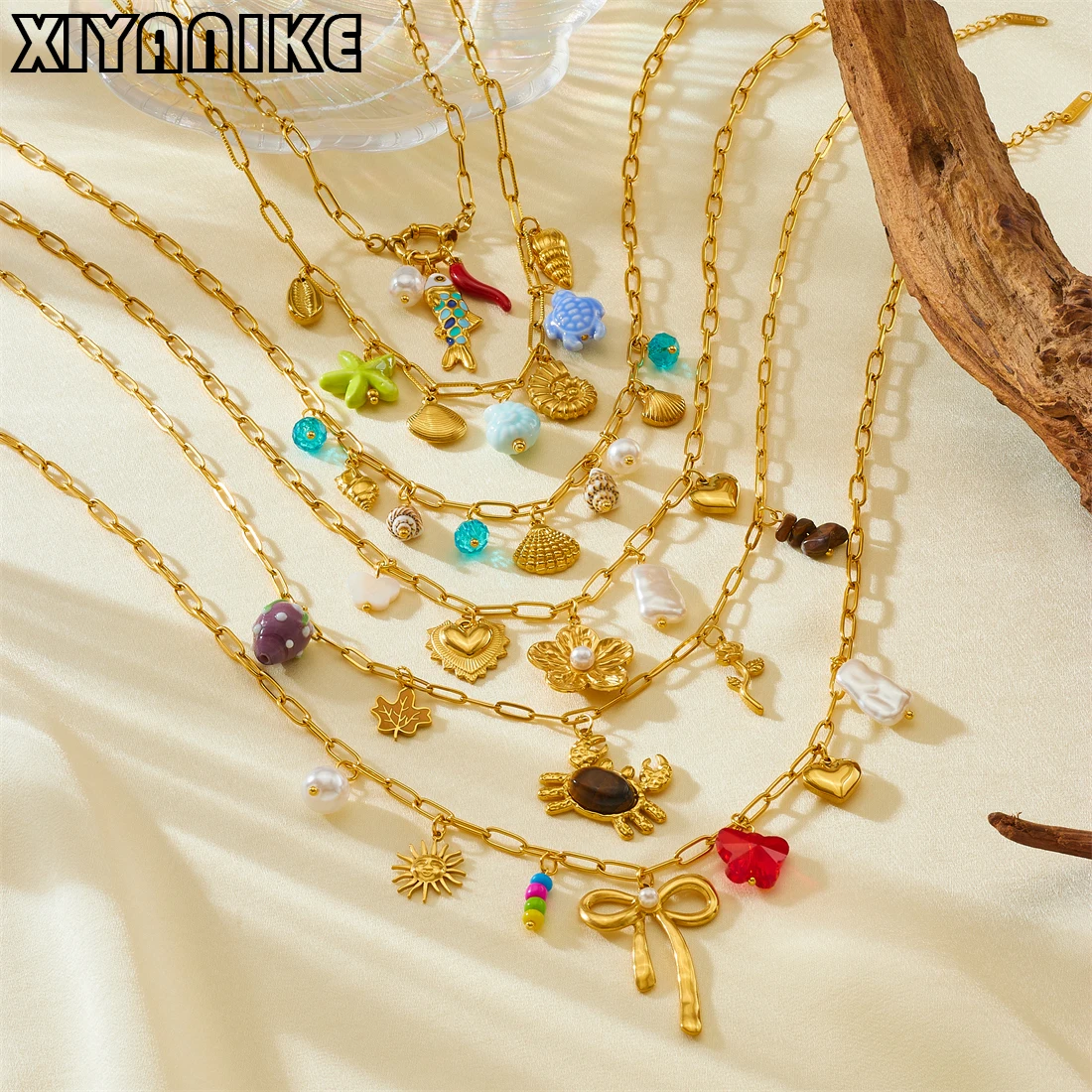 

XIYANIKE 316L Stainless Steel Trendy Lock Chain Fish Bone Conch Shell Crab Bow Flower Charm Necklace Women Glamorous Neck Chain
