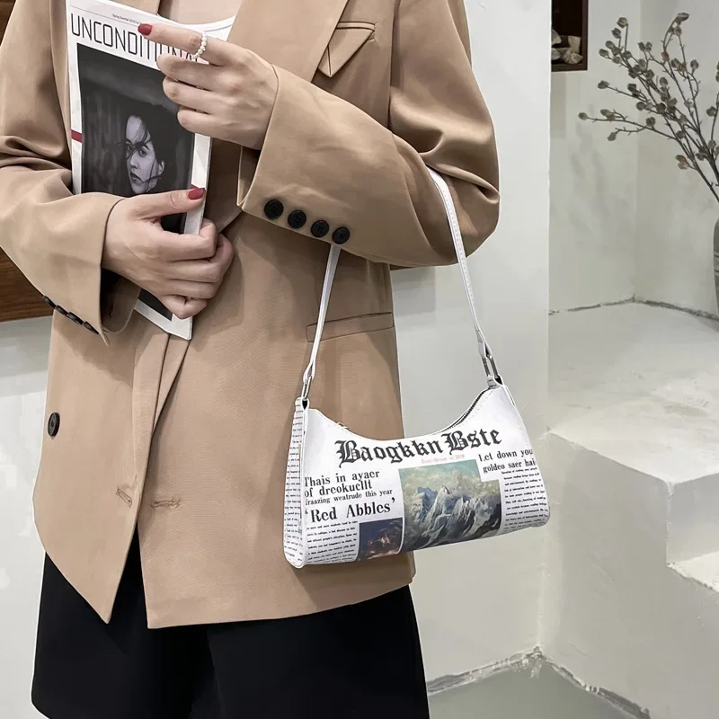 Moda donna giornale lettera stampa PU borsa a tracolla in pelle ascellare borse Casual da donna con fibbia piccola borsa