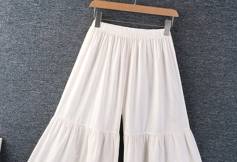 Pantaloni a gamba larga ricamati scavati per ragazza dolce Mori primavera estate Pantaloni da donna in cotone tinta unita in vita elastica stile