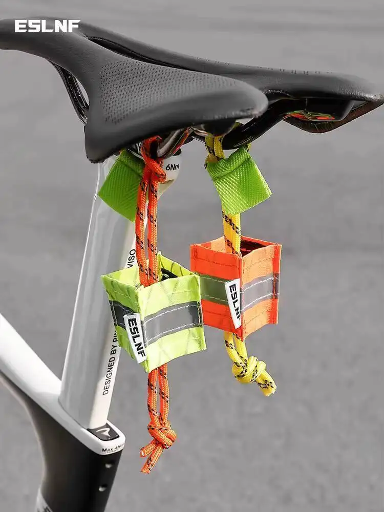 AliExpress ESLNF Reflective Bike Seat Hanger Safety Pendant High Visibility Night Riding Accessory Unique for Road Mountain Bikes