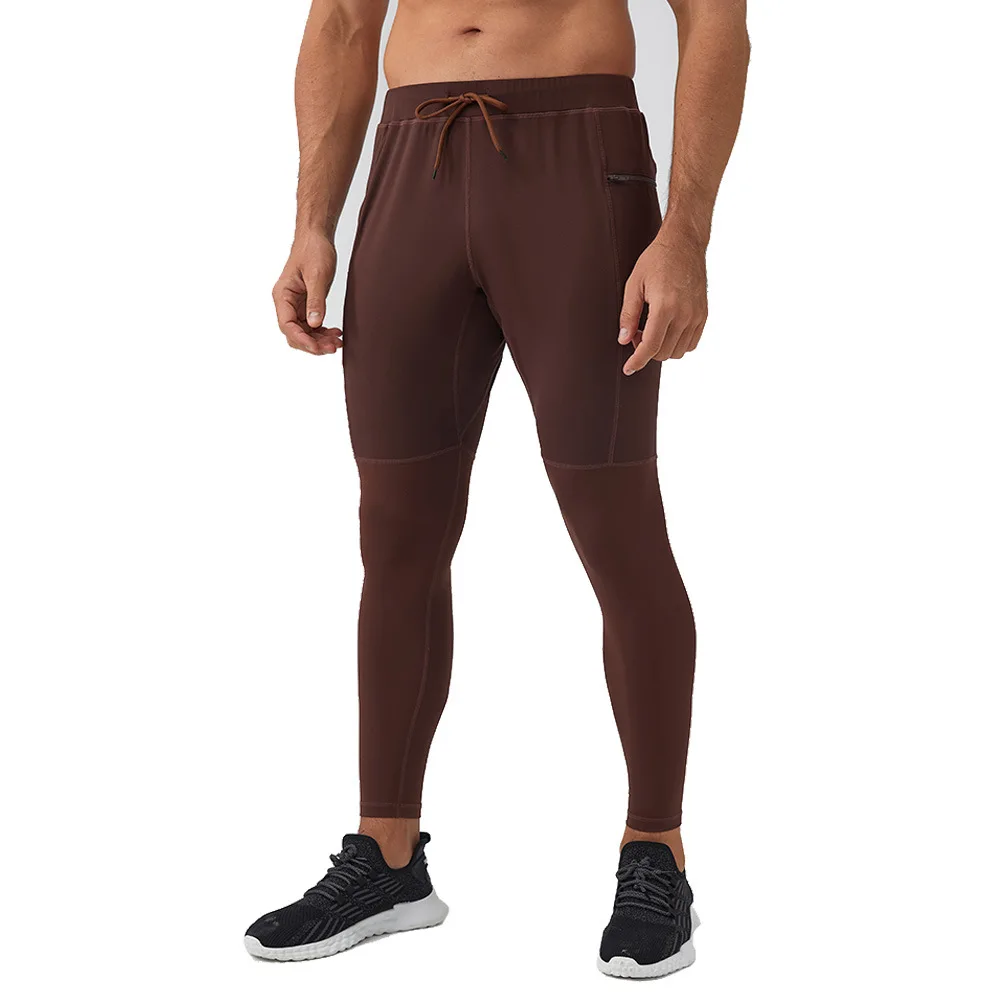 新しい圧縮ストレッチスポーツパンツメンズワークアウトパンツタイツレギンスパンツ男性用ジッパーポケット速乾性ジムトレーニング