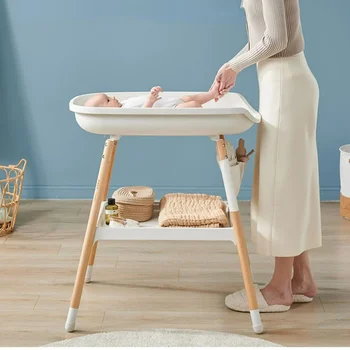 Table de soins pour bébé au design nordique simple, station de couches en hêtre stable et durable, table de massage pour nouveau-né, station de remplacement pour bébé