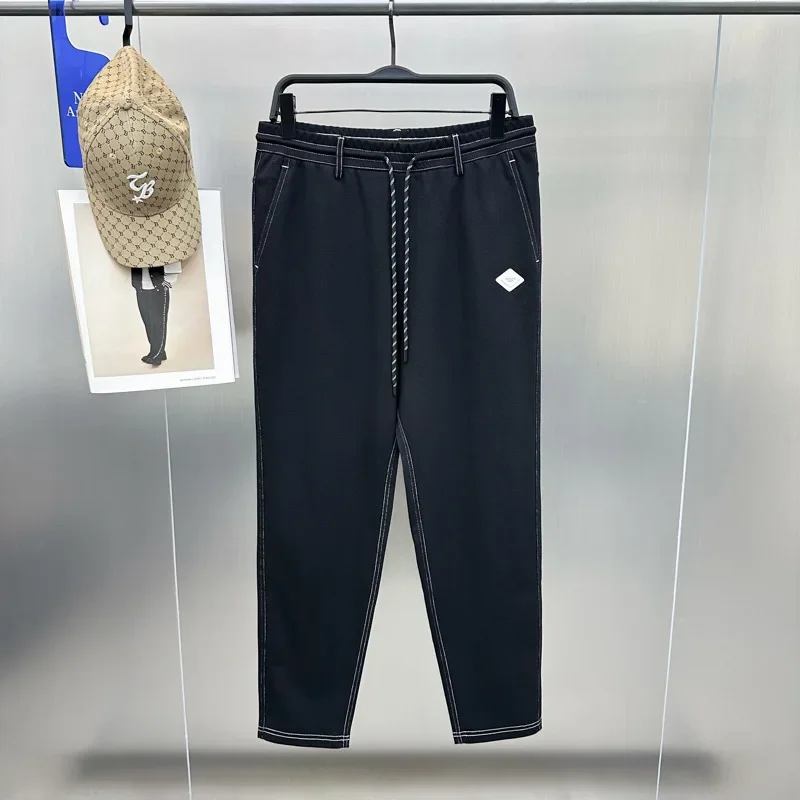 Men's knitted tapered fashionable and comfortable elastic waist sports pants versatile men's casual pants