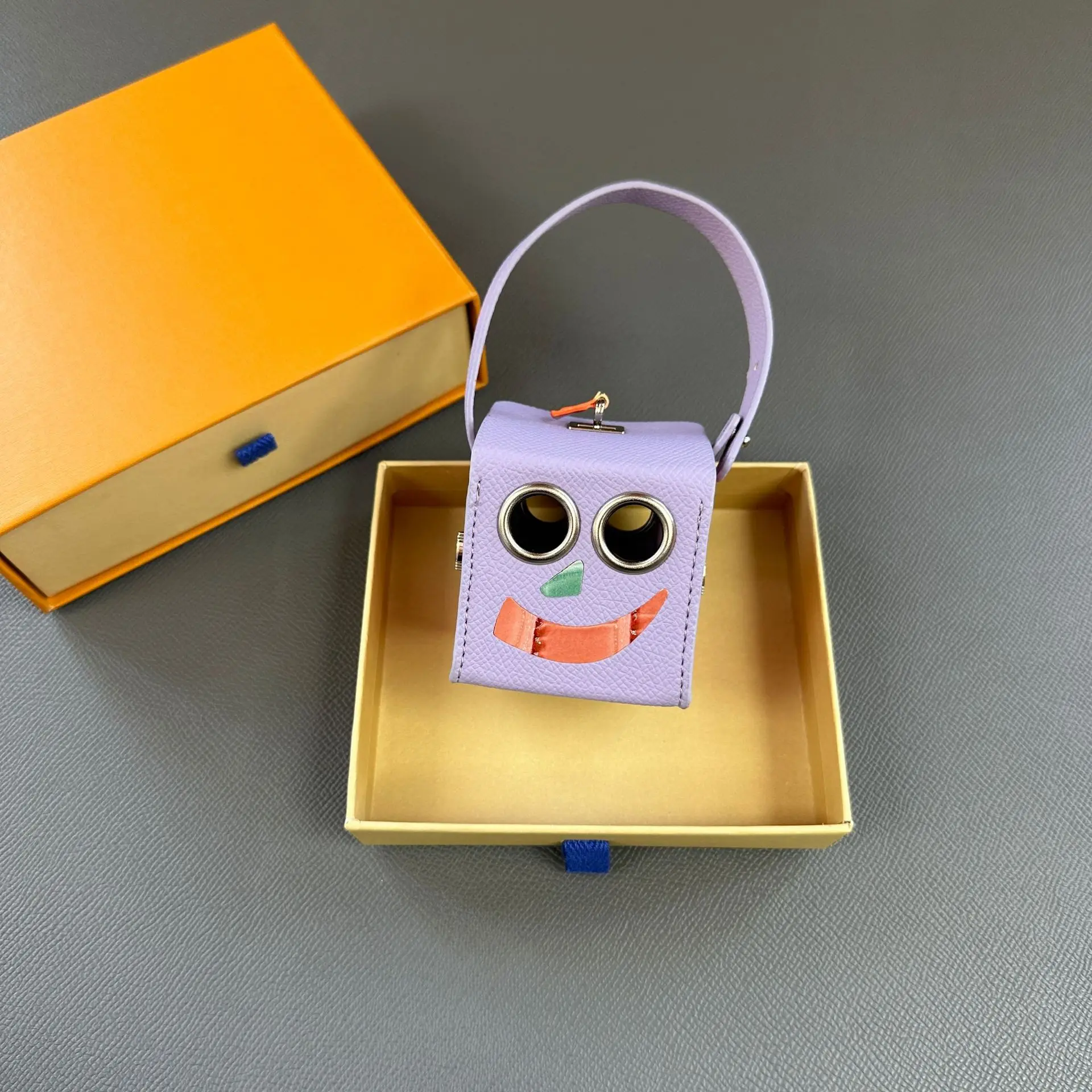 New Leather Earphone Bag Charm Neat And Orderly Storage Cute Funny Keychain Pendant Robot Creative Design Mini Bag Accessories