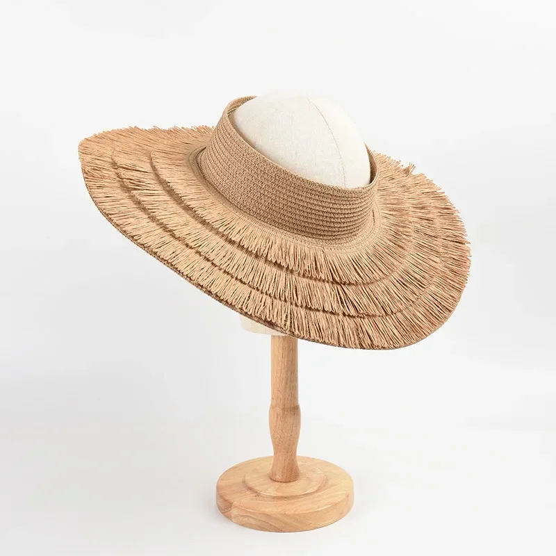 2025 New Fashion Women's Big Brim Sunscreen Sun Hat Summer Designer Beach Anti-ultraviolet Empty Top Tassel Straw Hat Wholesale