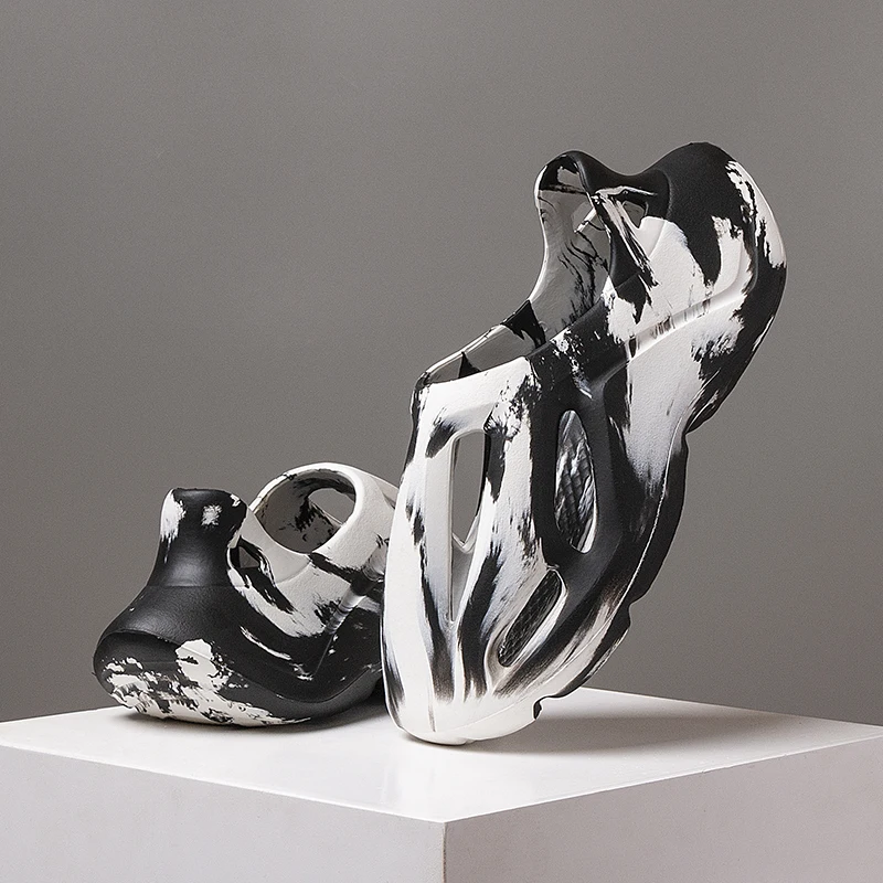 Unisexowe klapki na platformie w kamuflażu, miękki materiał EVA, technologia formowania wtryskowego, buty plażowe i outdoorowe dla mężczyzn i kobiet.