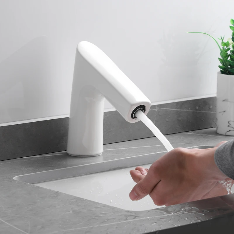 

Nordic ceramic white induction faucet single cold and hot intelligent induction faucet full-automatic infrared hand washer