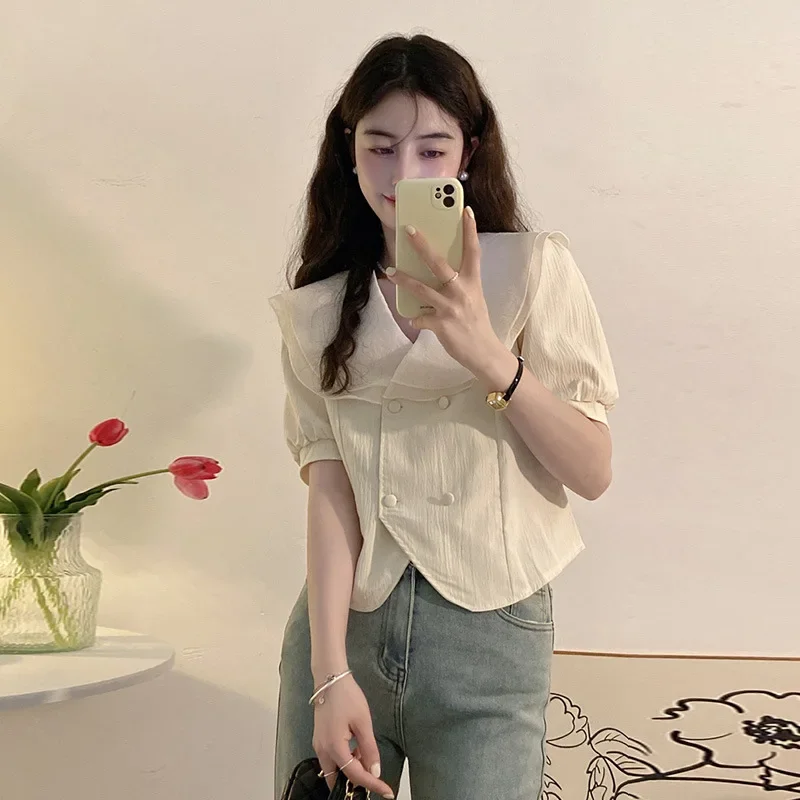 Camicia fresca a maniche corte da donna Estate 2025 Camicie con colletto alla Peter Pan in stile coreano con bordo a foglia di loto