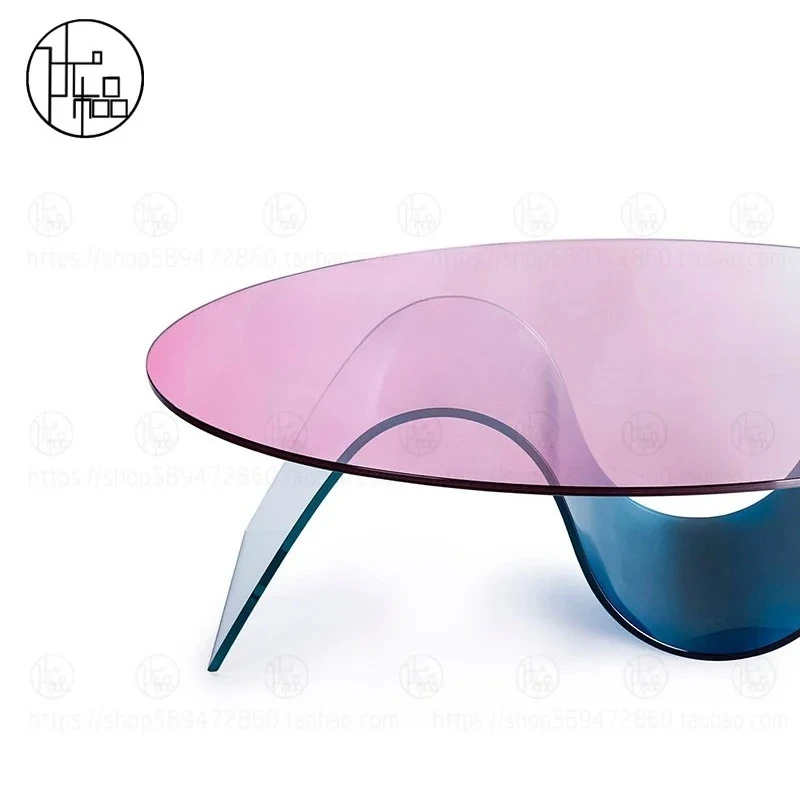A Nordic creative round coffee table acrylic living room hotel bed and breakfast side table, glass model