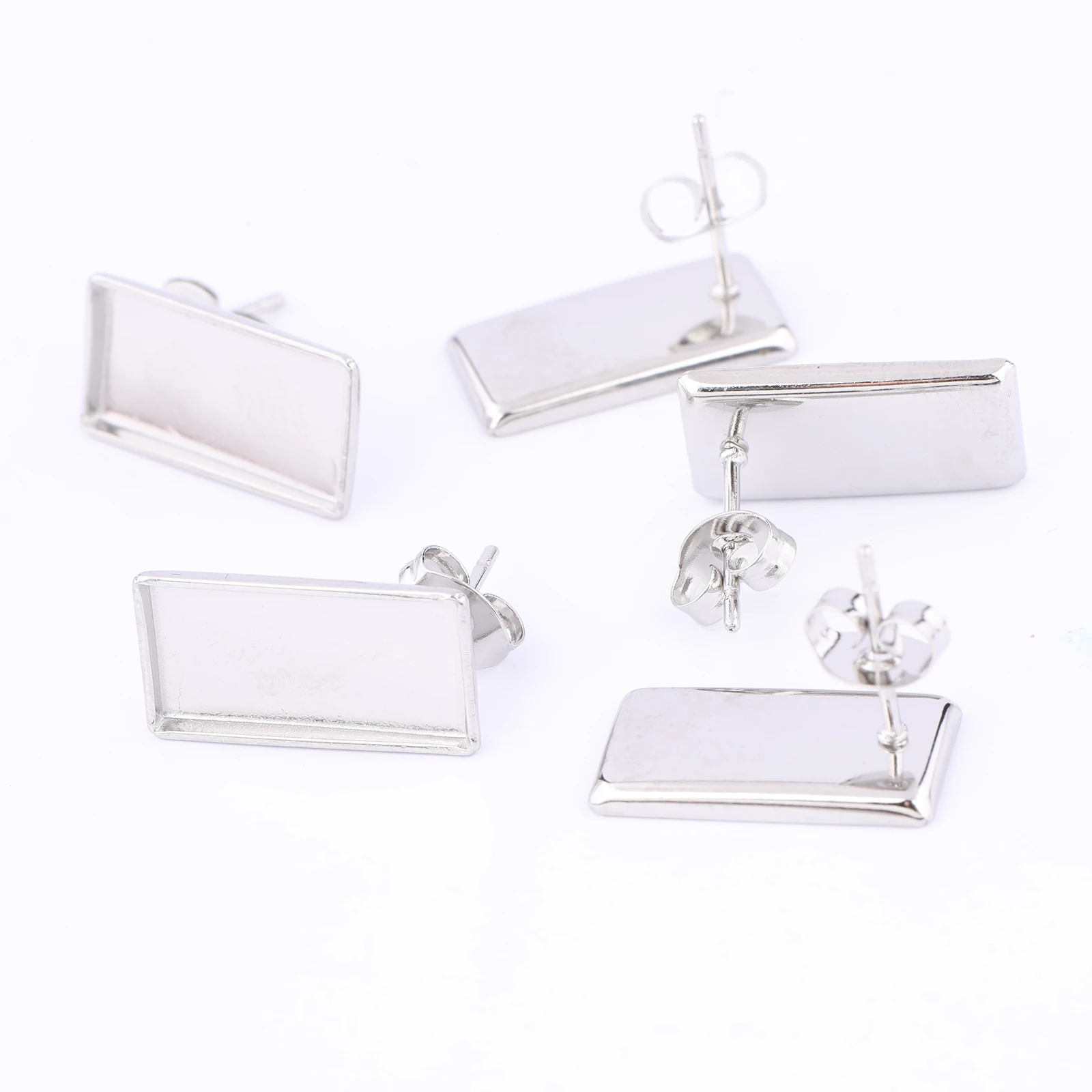 10 Stück Edelstahl 7 x 14,5 mm rechteckige Cabochon-Ohrring-Basisrohlinge Ohrstecker mit passender Glas-DIY-Lünette Ohrring-Einstellungen