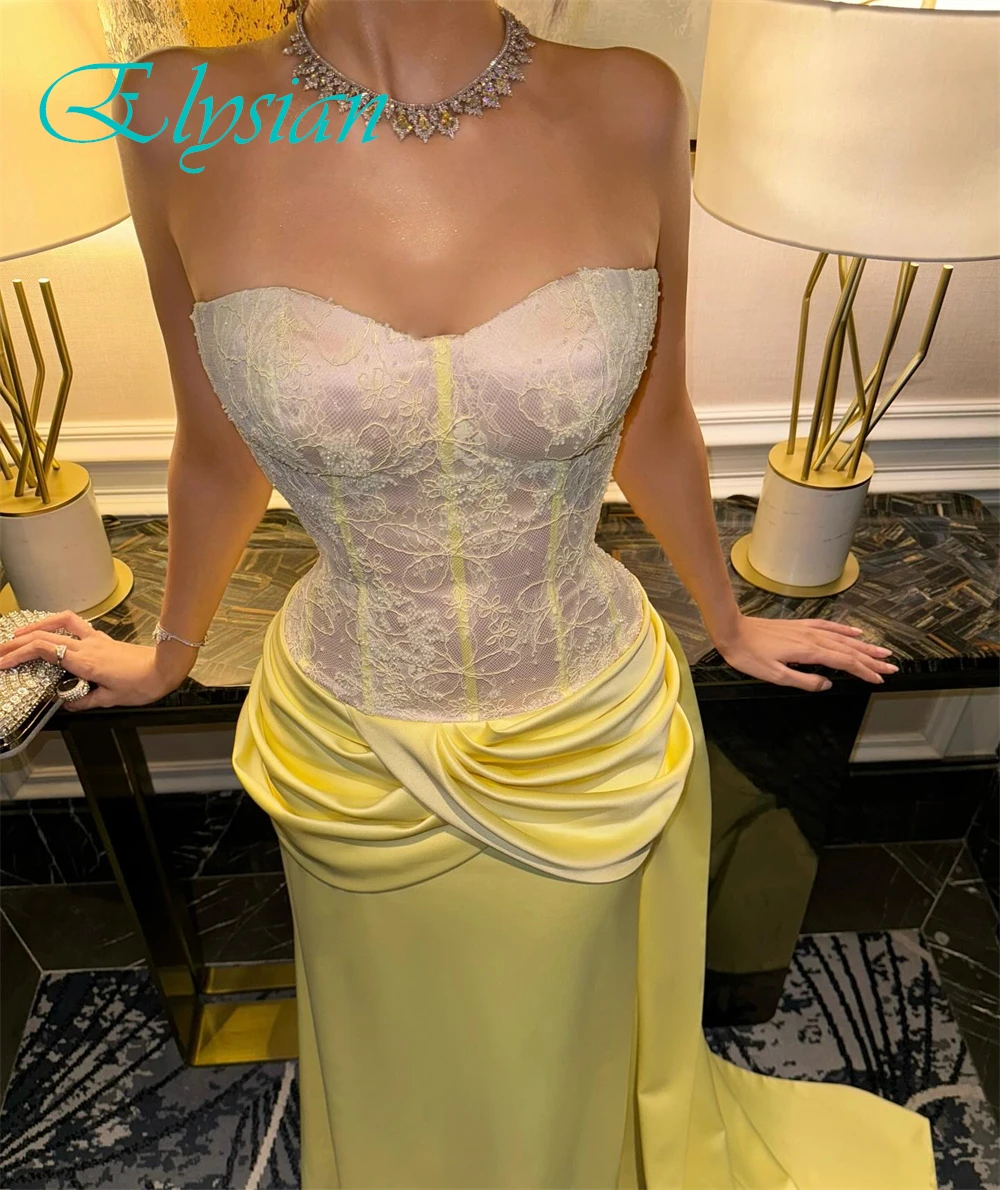 ชุดราตรีสุดหรูแบบสั่งตัดคุณภาพสูง ดีไซน์เกาะอก แขนกุด สง่างาม พร้อมชายกระโปรงยาวแบบคลาสสิก เหมาะสำหรับงานพิเศษ