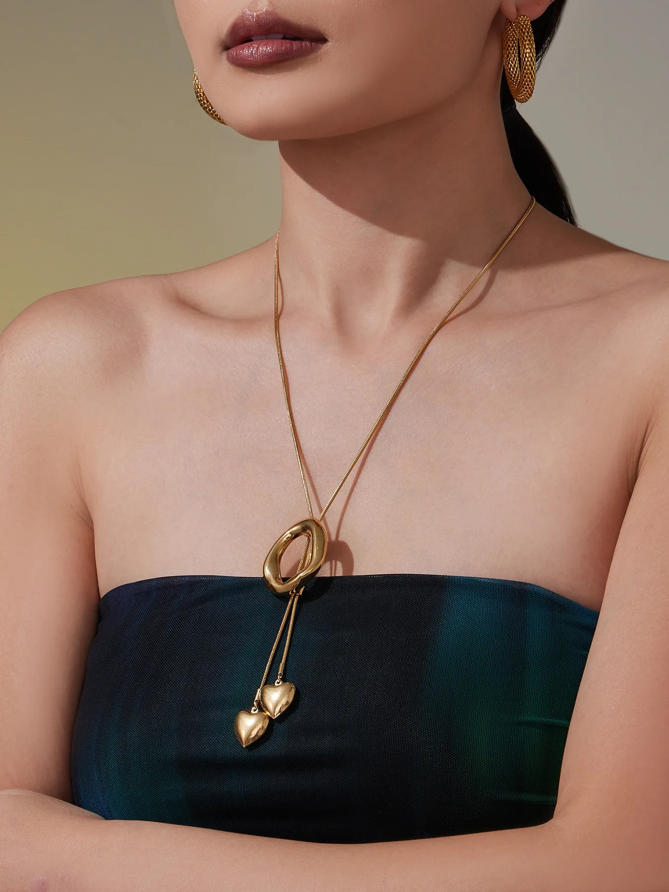 Stainless steel irregular round pull-out love pendant long necklace niche design sense autumn and winter sweater chain