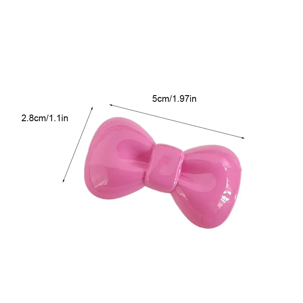 Рисунок 6 - Милая заколка для волос с бантом ярких цветов