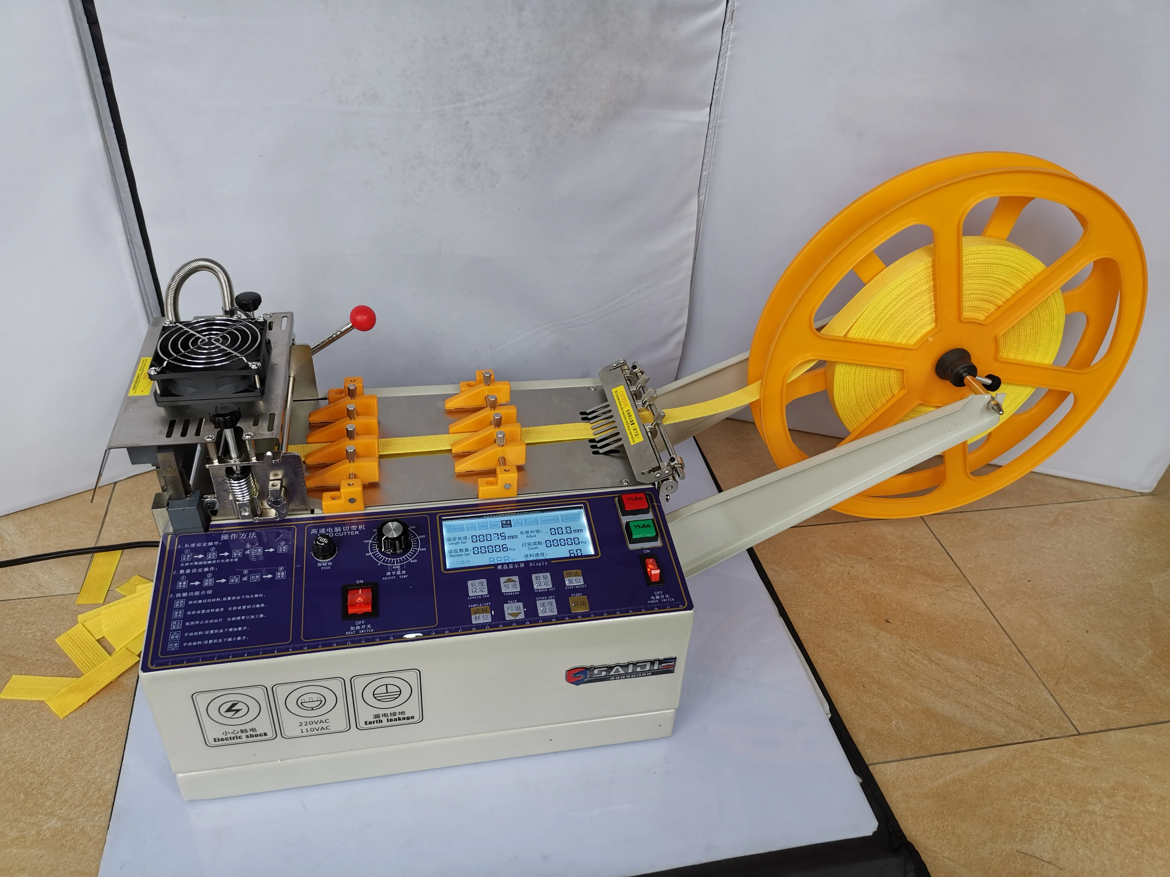 Computer automatic hot and cold Cloth tape cutting machine 140T ,magic adhesive tape zipper webbing elastic belt cutter
