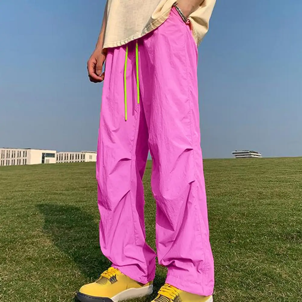 

Candy Color Pink Loose Fit Cargo Pants for Men Solid Streetwear Tooling Trousers Mid-waist Drawstring Beam Feet Parachute Pants