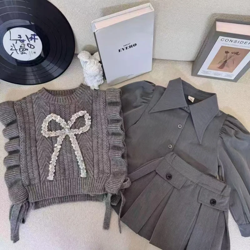 

Girls' Spring and Autumn New Western Style Knitted Vest Shirt Pleated Skirt College Style Three-Piece Set 90-140CM