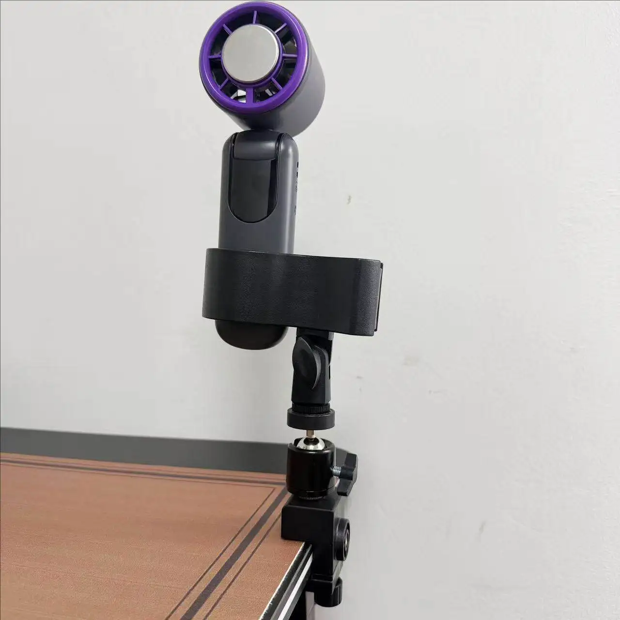 

Desktop Mini Fan Stand with 360° Rotating Tripod Clamp for Handheld Fans and Microphones