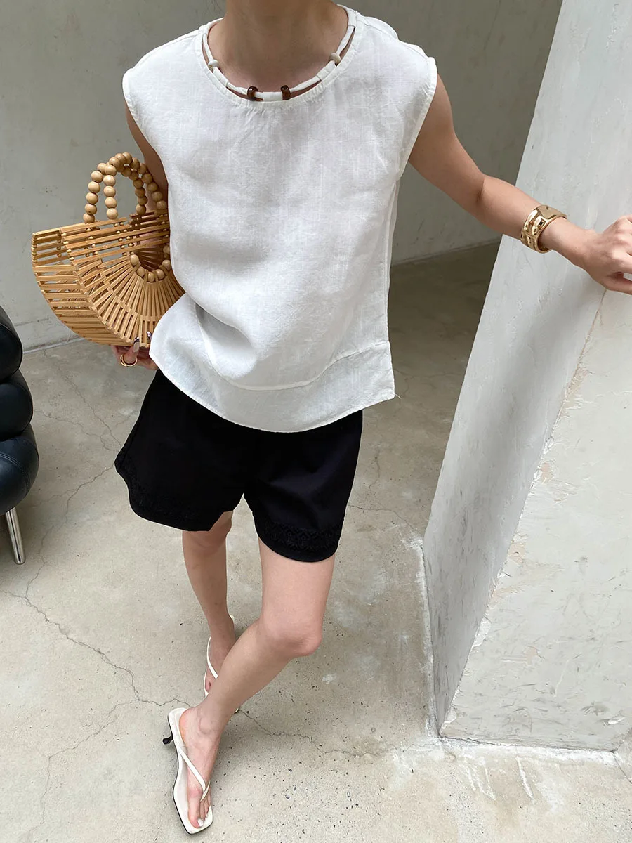 Sommerliche Damen-Shorts in unifarbenem Design mit elastischem Bund, besticktem Patchwork, lockerer Passform und weitem Bein. – Detail 8