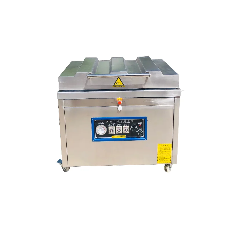 

Compact vacuum packaging machine
