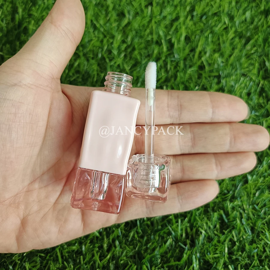 تصميم جديد 2 مل الوردي تويست فريد أنبوب ملمع الشفاه الفارغ أنابيب زيت الشفاه شعار مخصص تغليف مستحضرات التجميل