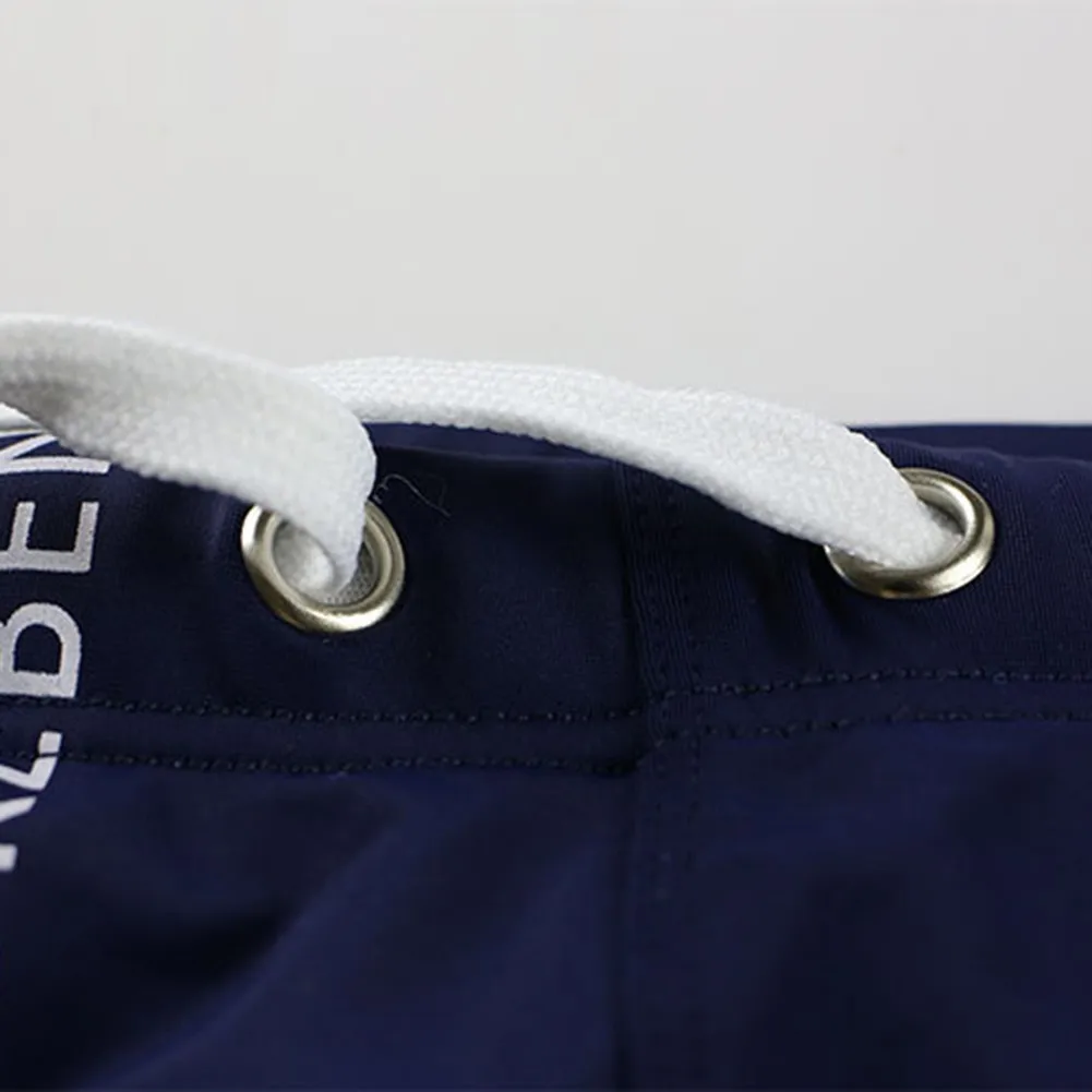 

Сексуальные мужские купальники, трусы-боксеры, дышащие шорты для плавания, перекрестная конструкция спереди, подходят для занятий пляжем и бассейном