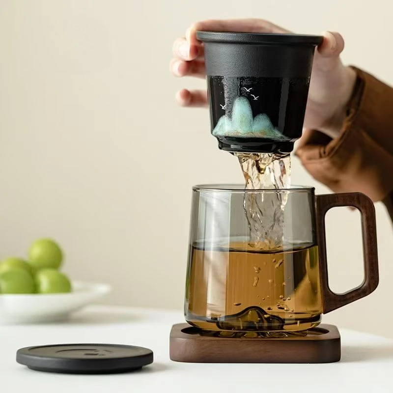 

Glass Teacup 450ml with Tea Leakage Tea Cup Mat, Heat Resistant Glass Separate Tea Brewing Anti Scalding Wooden Handle