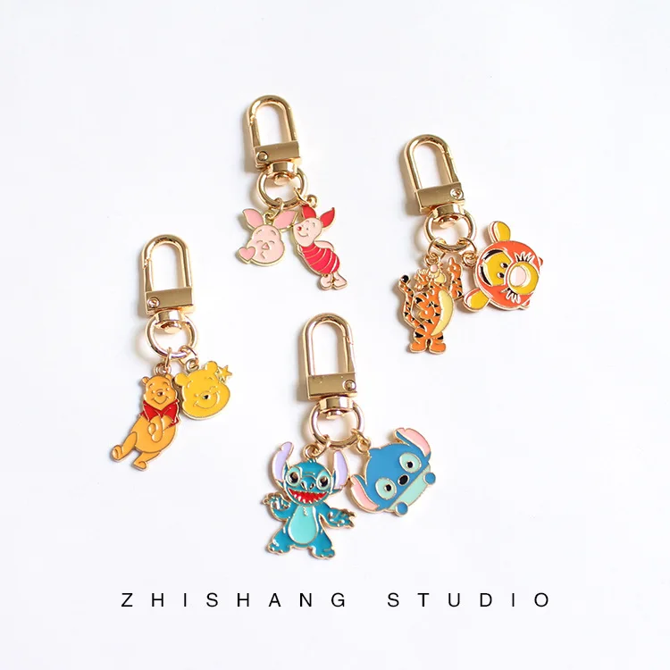 Disney stitch Keychain Winnie the Pooh Tigger Angel Action Anime Figure Cute Cartoon Backpack Keyring Pendant ornaments Gifts