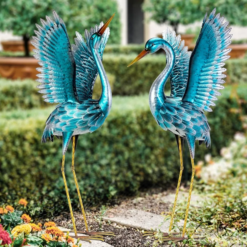 

Garden Crane Statues ， Blue Heron Decoy Garden Sculptures, Standing Metal Bird Yard Art for Patio Pond Backyard Decor(Set of 2)