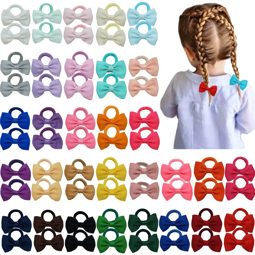 10pcs/lot 4.5*2.5 CM Solid Color Grosgrain Ribbon Bowknot Baby Elastic Hair Rope DIY Children Headwear Fashion Bows Hairband