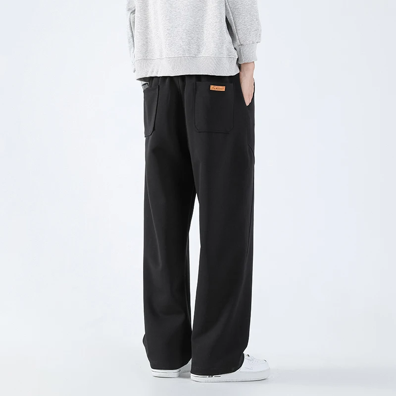 Pantaloni da uomo taglie forti L-10XL Vita elastica Vestibilità ampia Sport Gambe lunghe Moda casual Primavera Autunno Cotone Abbigliamento maschile 175KG